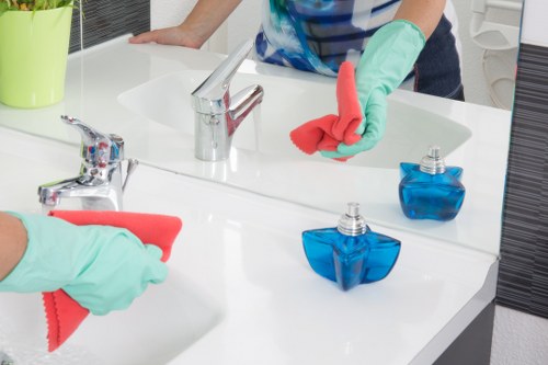 Cleaner working safely in a residential property