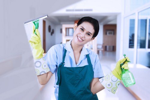 Cleaning staff maintaining a shared office area in Soho