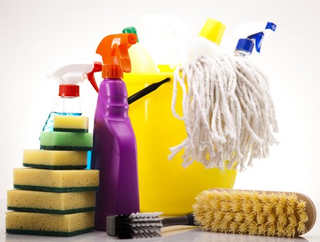 Local cleaning technician treating pet odour in a Soho flat interior